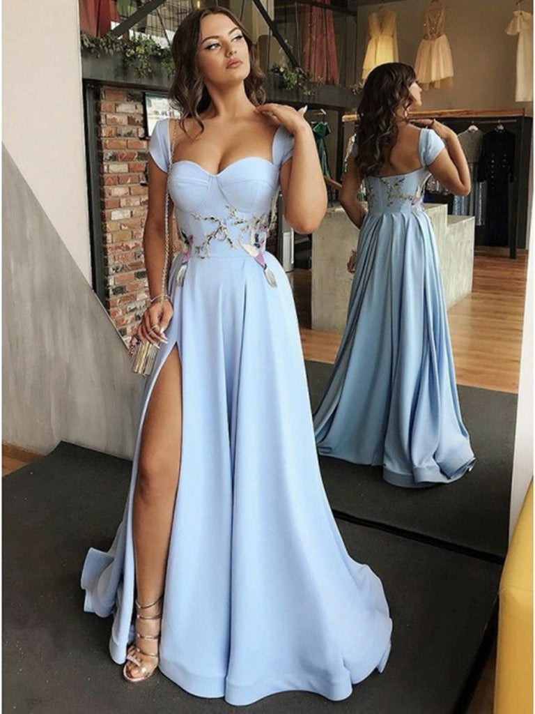 Sleeveless elegant blue evening gown with side slit tulle skirt and floral  appliquéd royal bodice
